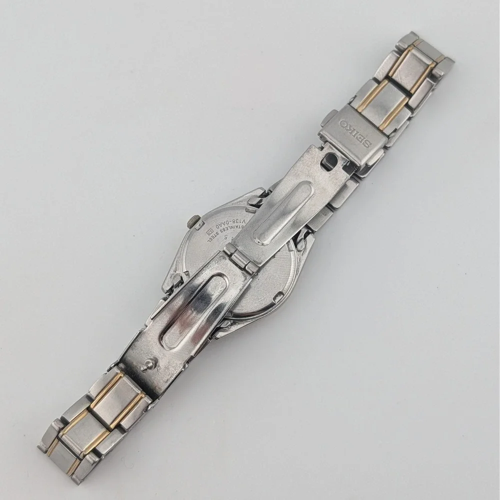 Seiko Solar V138-0AA0 Blue Sunburst Day/Date Two Tone Women's 25mm Watch